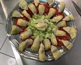 Une image de l'étape 7 de Salade de coeurs d'artichauts aux tomates, concombre et fleurs de thym.