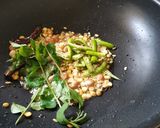 A picture of step 8 of Lemon Rice With Masala curd.