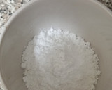 Foto del paso 3 de la receta: Glaseado de azúcar para bañar donuts