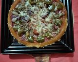 A picture of step 3 of Veg pizza.