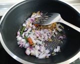 A picture of step 8 of Cabbage curry with green peas nd potato.