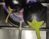 A picture of step 1 of Baingan Ka Bharta (eggplant 🍆).