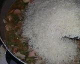 Foto del paso 4 de la receta: Arroz trifásico (pollo, cerdo y carnes frias)