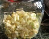 A picture of step 3 of Mango pickle with asafoetida.