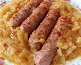 A picture of step 1 of Sausages In Apple & Onion Sauce.
