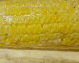 A picture of step 5 of Mayo Parmesan Corn On the Cob.