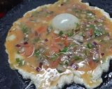 A picture of step 2 of Omlate, Roti,Sendwich.