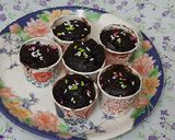 A picture of step 5 of Chocolate cup cakes with harshley Syrup and choco chips.