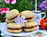 Foto del paso 4 de la receta: Alfajorcitos de coco, avena y dulce de leche💕