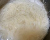 A picture of step 3 of 3 layered rice vermicelli in coconut milk sauce.