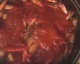 A picture of step 10 of Camarones a la Diabla.