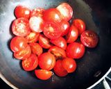 A picture of step 1 of Basil pesto spaghetti with loads of cherry tomatoes.
