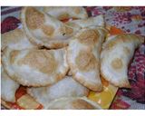 Foto del paso 11 de la receta: Empanadillas con verdeo, jamón, queso y huevo batido