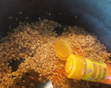 Foto del paso 6 de la receta: Arroz al horno con costillas, garbanzos, pimientos y ajos tierno