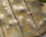 Foto del paso 6 de la receta: Lacitos de hojaldre con crema de chocolate y piñones