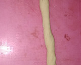 A picture of step 9 of Twisted Doughnuts.