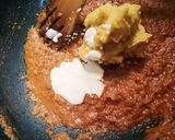 A picture of step 11 of Nawabi veg musallam with laccha paratha tart.