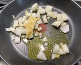 Une image de l'étape 5 de Poulet au curry,gingembre et amandes.