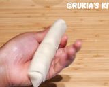 A picture of step 6 of Chicken springrolls.