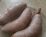 Foto del paso 3 de la receta: Chorizos a la pomarola con puré de papas