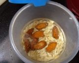 A picture of step 1 of Almond ghee dodhi.