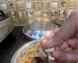 A picture of step 24 of Dal Bafla Baati Churma.