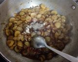 A picture of step 3 of Jhatpat khata meetha amla.