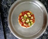 A picture of step 2 of Cheesy Bread Pizza Coins.