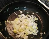 Foto del paso 2 de la receta Pimientos al gratén rellenos de cerdo especiado