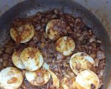 A picture of step 6 of #flavor4...Egg pulao.