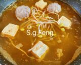 A picture of step 6 of Nanyang-Style Laksa Shrimp Noodles.