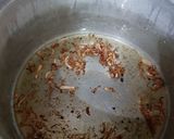 A picture of step 4 of Chicken yakhni pulao.