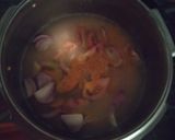 A picture of step 3 of Idli sambar with coconut chutney.