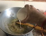 A picture of step 6 of Dahi wala Kukkad Chicken in yoghurt curry base.