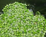 Foto del paso 2 de la receta: Alcachofas y guisantes estofados con huevo