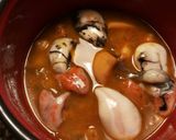 Foto del paso 4 de la receta Garbanzos con huevas de sepias en su tinta.