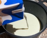 A picture of step 2 of Payesh (kheer).
