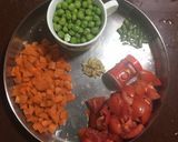 A picture of step 1 of Carrot and Peas Curry.