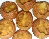 A picture of step 7 of Indian snack (crisp sphere with flavoured water/curd mixture).