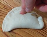 Foto del paso 3 de la receta: Empanadas queso, aceitunas y orégano