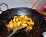 A picture of step 3 of Aloo Shimla mirch without onion garlic.