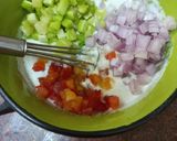 A picture of step 3 of Mix veg raita.