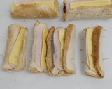 Foto del paso 2 de la receta: Rollitos de pan de molde con pavo y queso