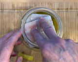 Foto del passaggio 3 della ricetta Merluzzo in Olio Vasocottura al microonde