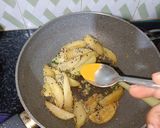 A picture of step 7 of Aloo Posto.