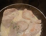 A picture of step 5 of Pork Chops Cooked in Milk and Herbs.