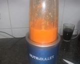 A picture of step 1 of Orange Carrot Ginger Smoothie.