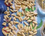 A picture of step 4 of Cavatelli with tomato and rocket.