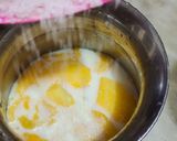 A picture of step 2 of Mango shake with icecream.