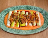 Foto del paso 4 de la receta Puerros con salsa de pimientos al piquillo